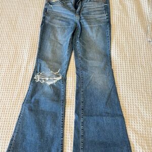 American Eagle Outfitters Blue Flare Jeans with Distressed Details
